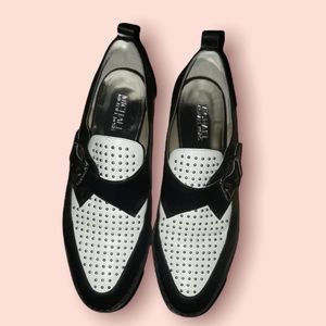 Black and white loafers